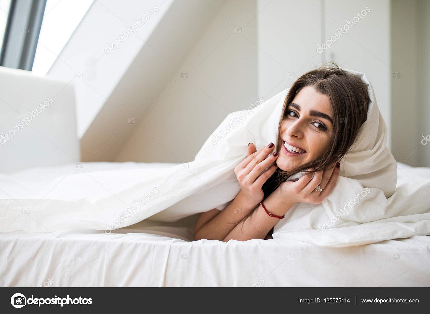 Женщина в кровати