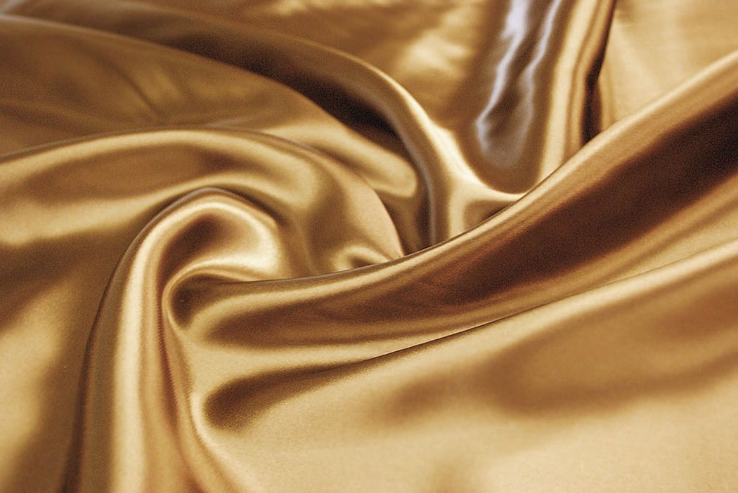 Золотая атласная ткань