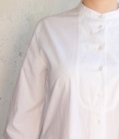 Белая рубашка женская свободного кроя